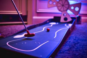 Crazy golf indoors Clownfish Events scaled 1 300x200